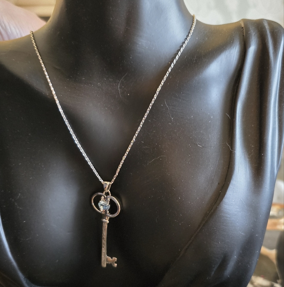 Elegant Sterling Silver Key Pendant Necklace With Blue Stone